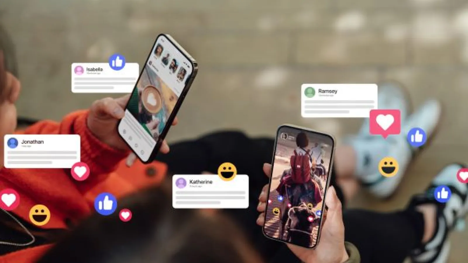 closeup of phones displaying social media messages and emojis