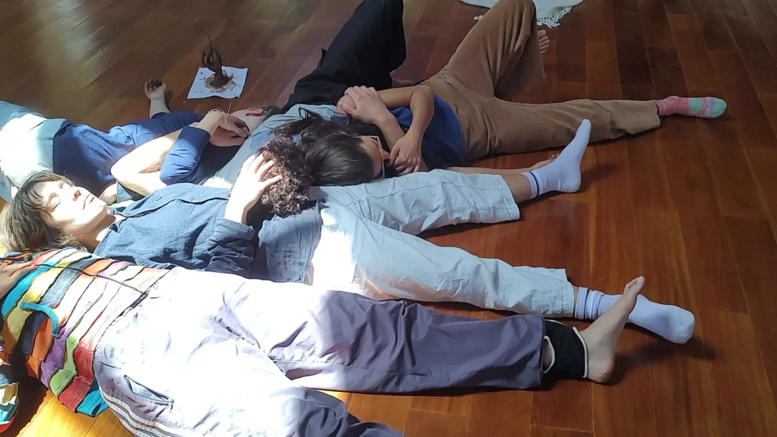 Students laying on the floor