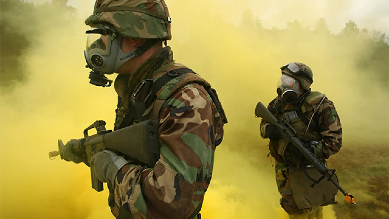 Soldiers training in yellow smoke