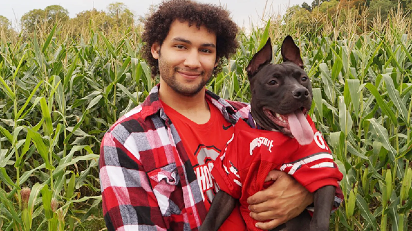 Evan Baugh and his dog, Hades