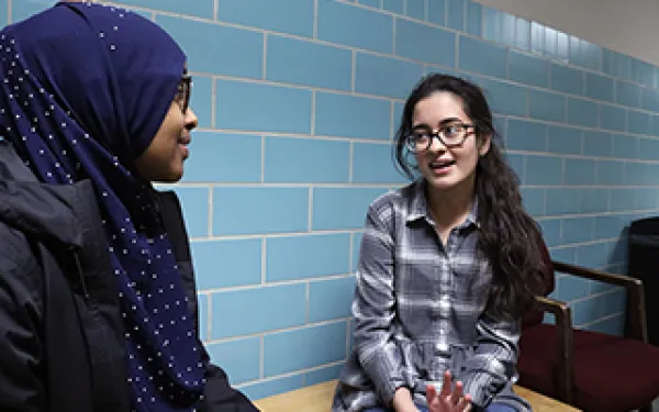Students talking in hall