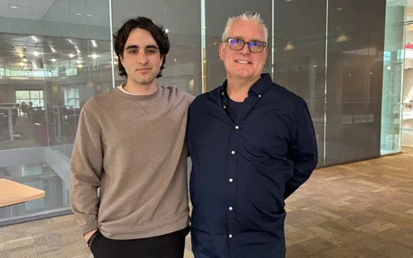 Phillip and Tom standing together